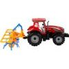 Červený traktor s obracečkou na setrvačník