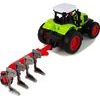 Zelený traktor s pluhem na dálkové ovládání