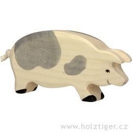 Stojící strakatá koza - domácí zvíře ze dřeva