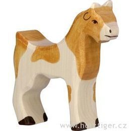 Stojící strakatá koza - domácí zvíře ze dřeva