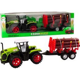 Zemědělský traktor s přívěsem na dřevěné klády