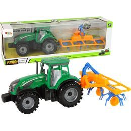 Zelený traktor s obracečkou sena pro děti