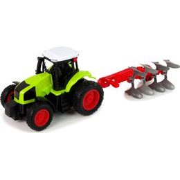 Zelený traktor s pluhem na dálkové ovládání