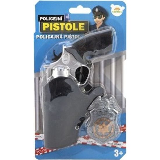 Policejní pistole v pouzdru s odznakem