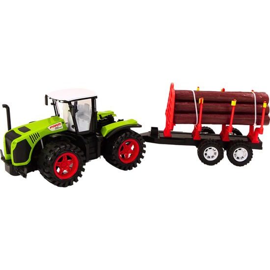 Zemědělský traktor s přívěsem na dřevěné klády