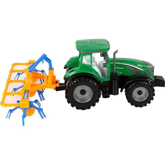 Zelený traktor s obracečkou sena pro děti