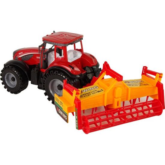 Traktor s kultivátorem červený na setrvačník