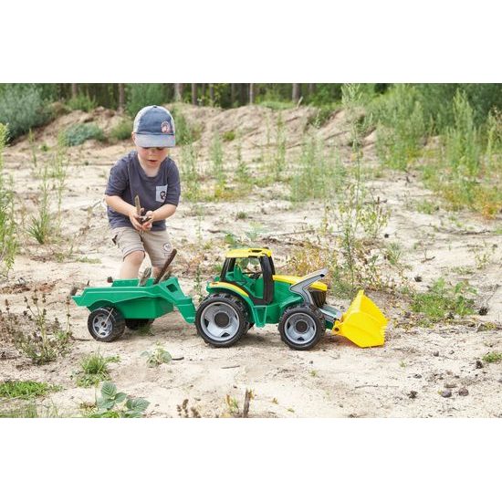 Traktor se lžící a přívěsem