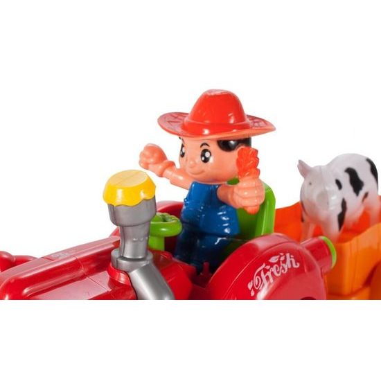 Veselý traktor pro nejmenší se světly a zvuky Cartoon Tractor červený