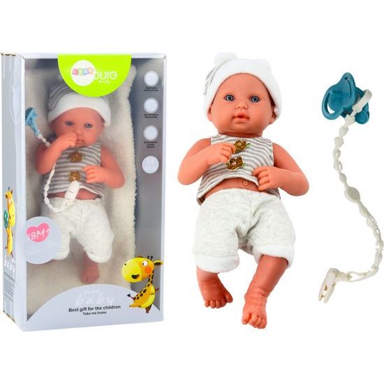 Panenka miminko v bílo-šedém oblečení s dudlíkem a dekou