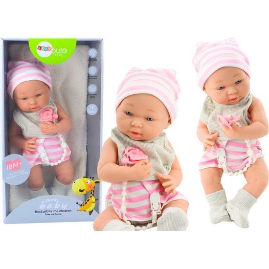 Panenka miminko v bílo-růžovém oblečení s bryndákem, dudlíkem a dekou