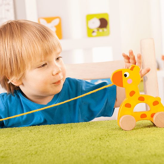 TREFL Edukační dřevěná tahací hračka Žirafa žlutá