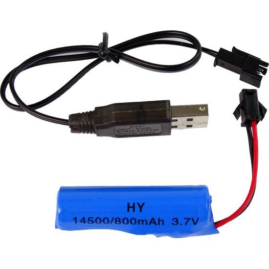 Zelený traktor s pluhem na dálkové ovládání