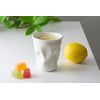 Zmačkaný hrnek - Porcelánový vtip