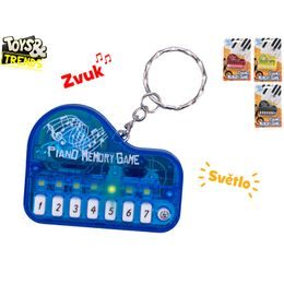 Toys&Trends přívěsek na klíče piano 6cm na baterie se světlem a zvukem 19 skladeb 4barvy na kartě