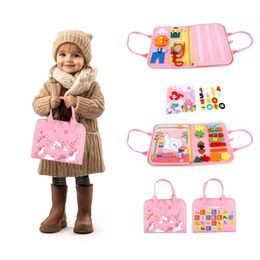 2Kids Toys Senzorická busy kniha Jednorožec 1