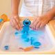 COOKIE MOSTER Figurka Glo Pals + 2 svítící kostky do vody